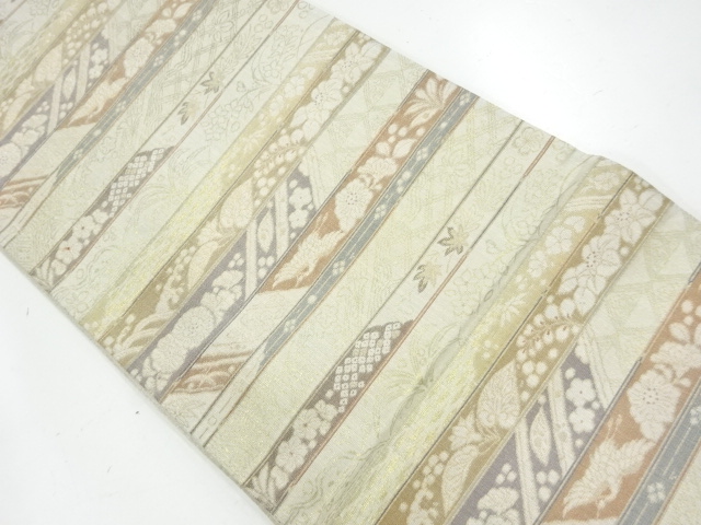 横段に鶴・草花模様織出し　袋帯